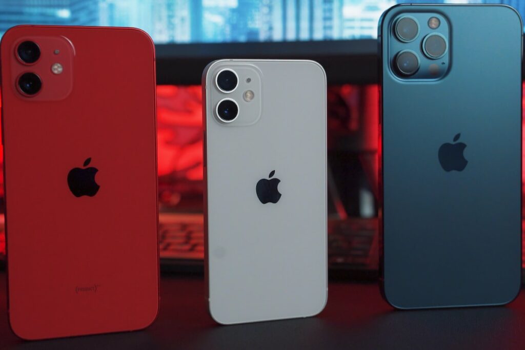 silver iphone 6 and red iphone case